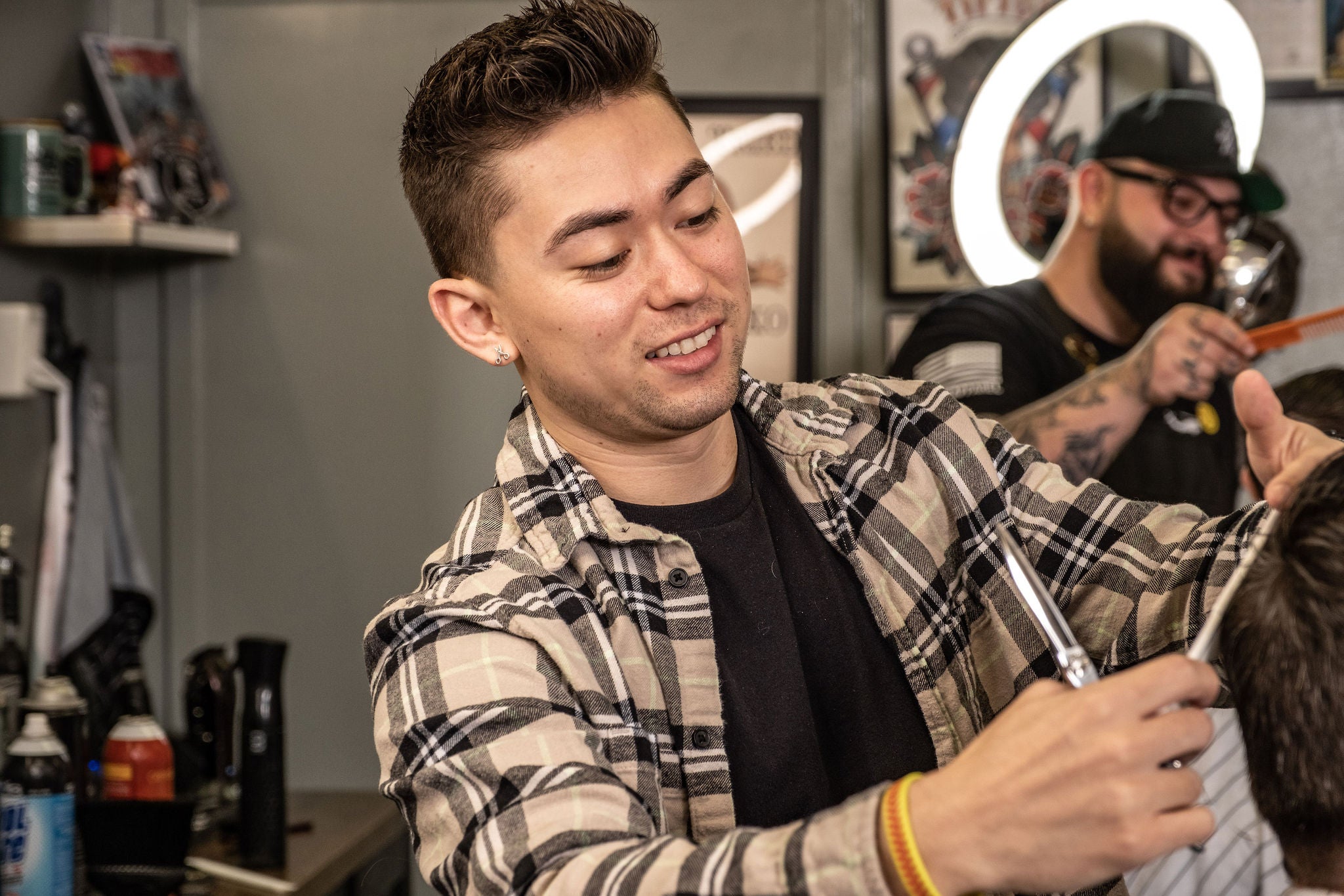 The talented team at Roughnecks Barbershop, ready to provide top-notch grooming services.
