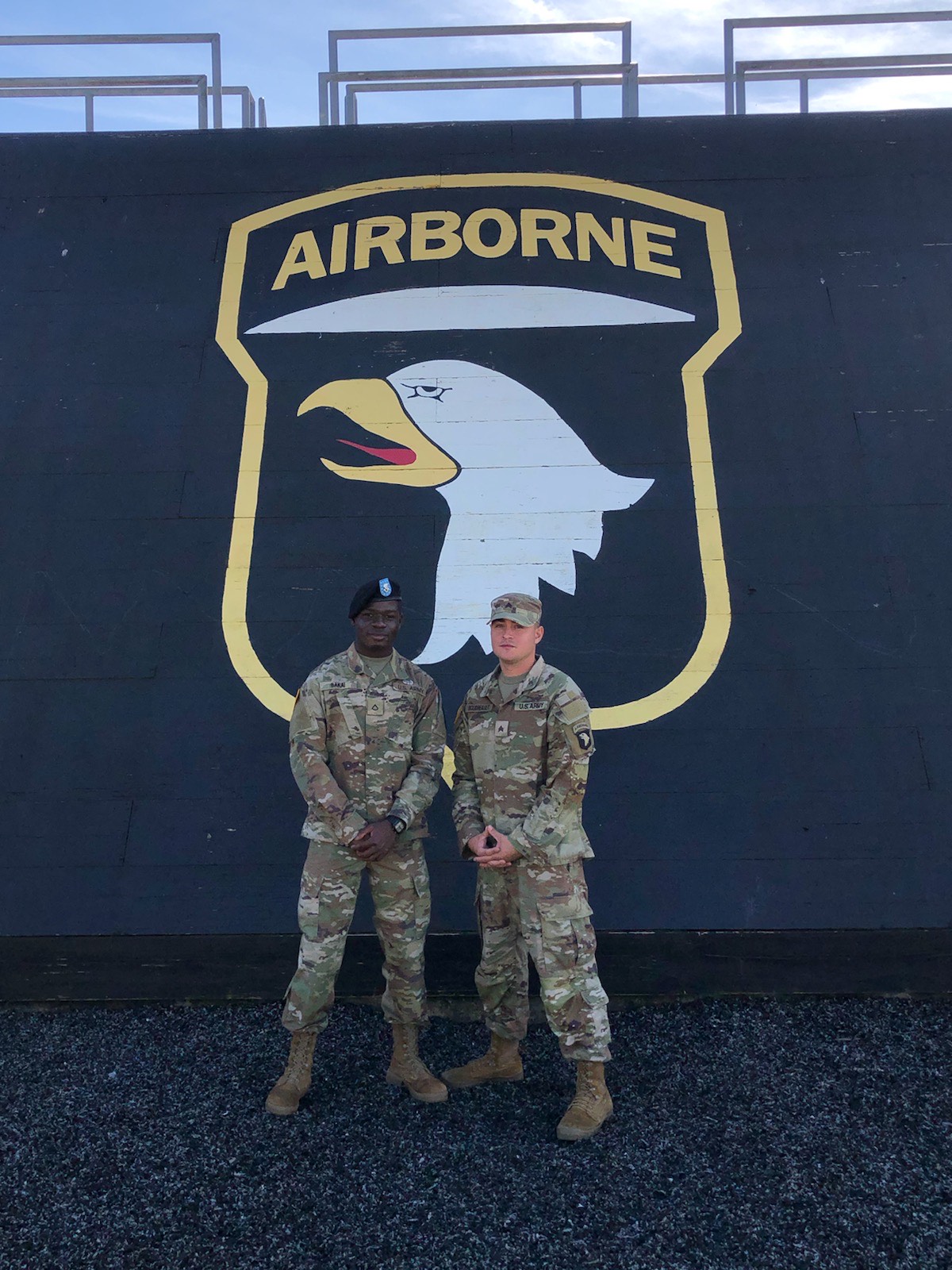 Students display flag-related art during a Veterans Day celebration.